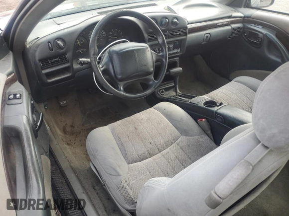 1998 Chevrolet Monte Carlo LS with VIN 2G1WW12M2W9251866, listed as a Copart auction lot 59701835 with 104,203 mi miles and Salvage title. Bid and sale history available at DreamBid. Image 8.
