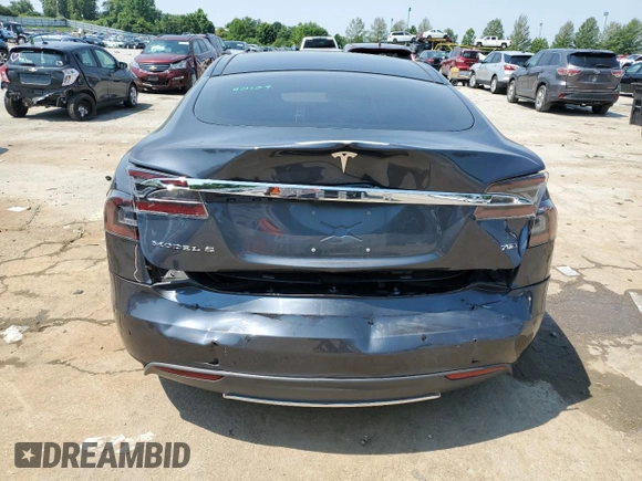 2016 Tesla Model S 90D с VIN 5YJSA1E28GF129962, выставлен на аукционе Copart как лот 59973365 с пробегом 57 944 миль миль и Списание • Salvage title. История ставок и продаж доступна на DreamBid. Изображение 6.