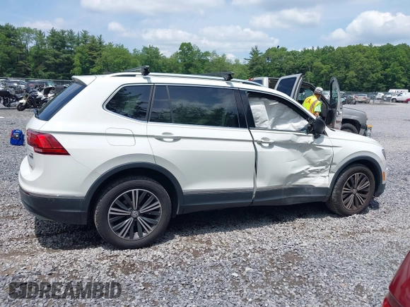 2018 Volkswagen Tiguan SEL с VIN 3VV2B7AX3JM036157, выставлен на аукционе IAAI как лот 42506274 с пробегом 102 947 миль миль и . История ставок и продаж доступна на DreamBid. Изображение 13.