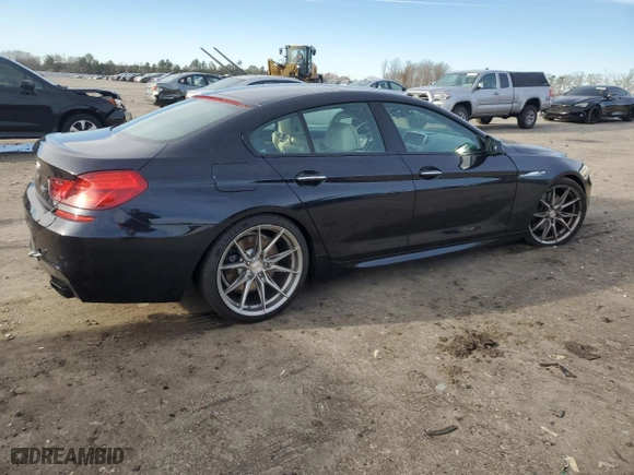 2014 BMW 6 Series 650i with VIN WBA6B2C51ED128896, listed as a Copart auction lot 84801734 with 142,181 mi miles and Salvage Title. Bid and sale history available at carsss.com. Image 3.