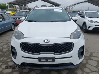 2018 Kia Sportage LX with VIN KNDPM3AC1J7413227, listed as a IAAI auction lot 42188566 with 77,897 mi miles and . Bid and sale history available at carsss.com. Image 12.