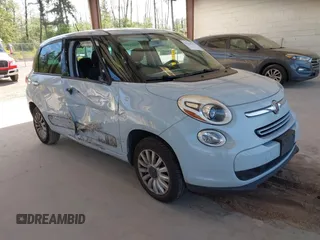 2015 FIAT 500L Easy z VIN ZFBCFABHXFZ030313, wystawiony jako IAAI lot #42234717 z przebiegiem 185 735 mil mil oraz . Historia ofert i sprzedaży dostępna na DreamBid. Obrazek 1.