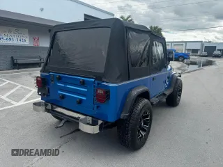 1992 Jeep Wrangler z VIN 2J4FY19P6NJ559597, wystawiony jako Copart lot #81398954 z przebiegiem 150 310 mil mil oraz Szkoda całkowita • Salvage title. Historia ofert i sprzedaży dostępna na DreamBid. Obrazek 4.