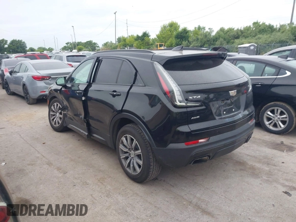 2019 Cadillac XT4 AWD Sport z VIN 1GYFZFR48KF197731, wystawiony jako IAAI lot #42668639 z przebiegiem 73 170 mil mil oraz . Historia ofert i sprzedaży dostępna na DreamBid. Obrazek 3.
