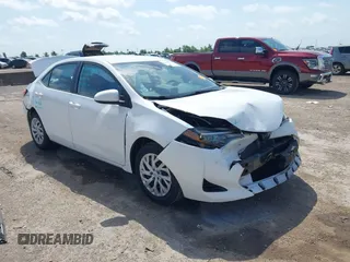 2018 Toyota Corolla L with VIN 5YFBURHE6JP829776, listed as a IAAI auction lot 42530923 with 61,596 mi miles and . Bid and sale history available at DreamBid. Image 1.