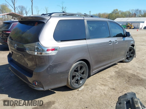 2015 Toyota Sienna SE with VIN 5TDXK3DC3FS682327, listed as a IAAI auction lot 41983156 with 141,640 mi miles. Bid and sale history available at carsss.com. Image 4.