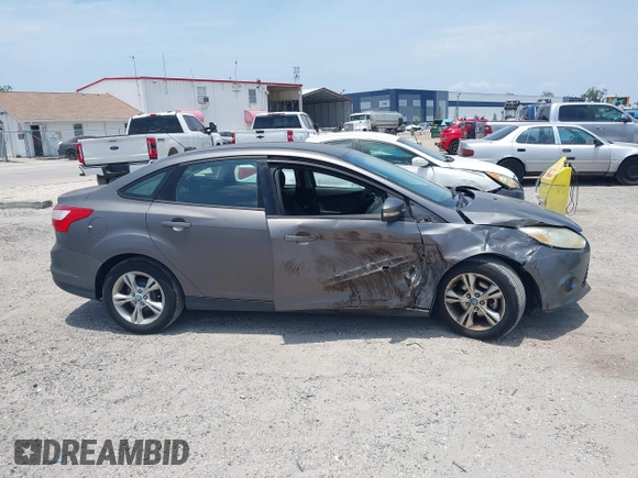 2013 Ford Focus SE with VIN 1FADP3F2XDL155799, listed as a IAAI auction lot 42338358 with 160,812 mi miles and . Bid and sale history available at DreamBid. Image 14.