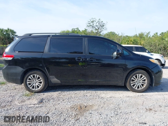 2011 Toyota Sienna XLE AAS with VIN 5TDYK3DC7BS051241, listed as a IAAI auction lot 42214806 with 253,860 mi miles and . Bid and sale history available at DreamBid. Image 13.