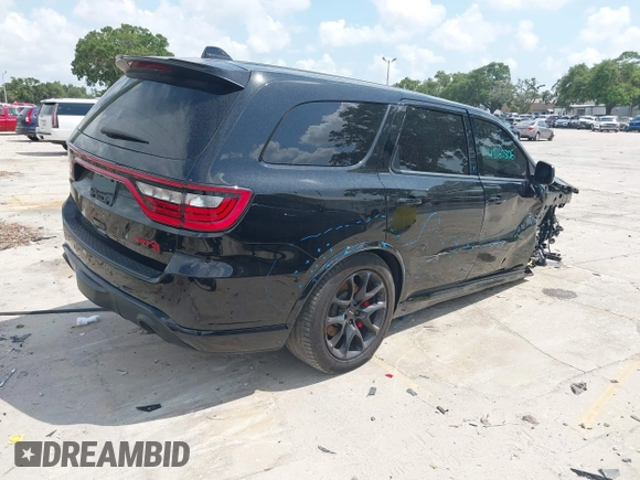 2023 Dodge Durango SRT Hellcat Premium with VIN 1C4SDJH9XPC554953, listed as a IAAI auction lot 42375728 with 19,492 mi miles and . Bid and sale history available at DreamBid. Image 4.