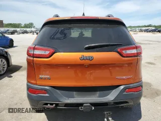 2015 Jeep Cherokee Trailhawk with VIN 1C4PJMBS5FW523019, listed as a Copart auction lot 55527955 with 107,503 mi miles and Salvage title. Bid and sale history available at DreamBid. Image 6.