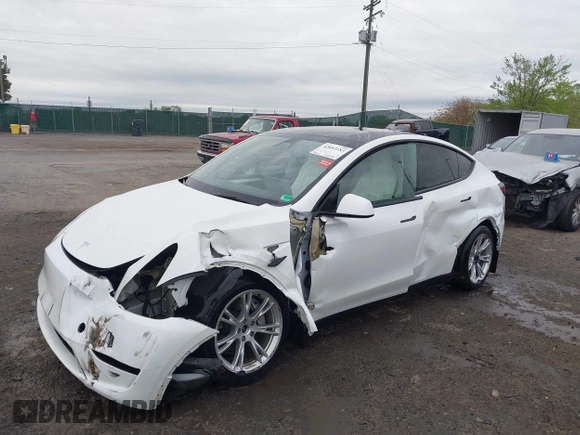 2024 Tesla Model Y Long Range with VIN 7SAYGAEE2RF014315, listed as a IAAI auction lot 42053183 with 36,521 mi miles and . Bid and sale history available at DreamBid. Image 19.