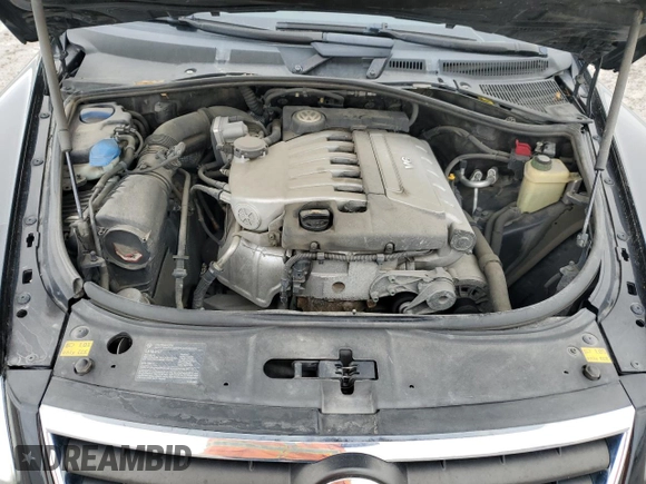 2004 Volkswagen Touareg z VIN WVGBC77LX4D062055, wystawiony jako Copart lot #45960445 z przebiegiem 201 819 mil mil oraz Szkoda całkowita • Salvage title. Historia ofert i sprzedaży dostępna na DreamBid. Obrazek 13.