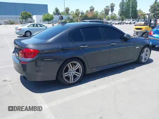 2014 BMW 5 Series 535i with VIN WBA5B1C51ED479359, listed as a IAAI auction lot 42396160 with 149,522 mi miles and . Bid and sale history available at DreamBid. Image 4.