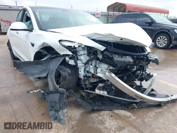 2023 Tesla Model 3 Performance z VIN 5YJ3E1EC8PF487550, wystawiony jako IAAI lot #42093712 z przebiegiem 27 305 mil mil oraz . Historia ofert i sprzedaży dostępna na DreamBid. Obrazek 6.