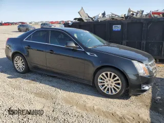 2011 Cadillac CTS Premium z VIN 1G6DP5ED4B0112165, wystawiony jako Copart lot #52224155 z przebiegiem 149 896 mil mil oraz Szkody całkowita. Historia ofert i sprzedaży dostępna na DreamBid. Obrazek 4.