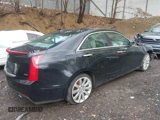 2013 Cadillac ATS Premium AWD z VIN 1G6AL5S36D0111869, wystawiony jako IAAI lot #42199637 z przebiegiem 148 404 mil mil oraz . Historia ofert i sprzedaży dostępna na DreamBid. Obrazek 4.