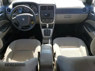 2010 Dodge Caliber SXT z VIN 1B3CB4HA7AD571525, wystawiony jako Copart lot #61651405 z przebiegiem 188 383 mil mil oraz Czysty tytuł • Clean title. Historia ofert i sprzedaży dostępna na DreamBid. Obrazek 8.