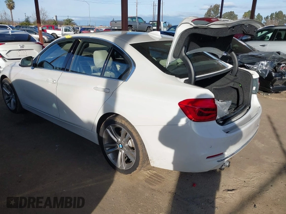 2016 BMW 3 Series 328i with VIN WBA8E9G58GNT47869, listed as a IAAI auction lot 41594120 with 57,561 mi miles. Bid and sale history available at carsss.com. Image 3.