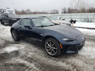 2021 Mazda MX-5 Miata Grand Touring with VIN JM1NDAM77M0454582, listed as a Copart auction lot 44959535 with 44,438 mi miles and Salvage title. Bid and sale history available at DreamBid. Image 4.