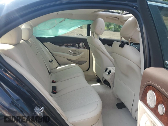 2017 Mercedes-Benz E 300 Luxury with VIN WDDZF4KBXHA185598, listed as a Copart auction lot 61011935 with 59,116 mi miles and Salvage title. Bid and sale history available at DreamBid. Image 10.
