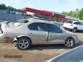 2000 Nissan Maxima GXE with VIN JN1CA31D4YT556029, listed as a IAAI auction lot 42160508 with 227,696 mi miles and . Bid and sale history available at DreamBid. Image 13.