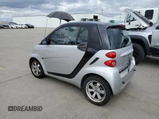 2012 Smart fortwo Pure z VIN WMEEJ3BA2CK549445, wystawiony jako Copart lot #48352495 z przebiegiem 53 406 mil mil oraz Tytuł czysty. Historia ofert i sprzedaży dostępna na DreamBid. Obrazek 2.