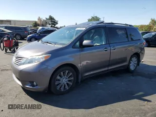 2015 Toyota Sienna Limited with VIN 5TDDK3DC4FS128166, listed as a Copart auction lot 64149405 with 103,366 mi miles and Salvage title. Bid and sale history available at DreamBid. Image 1.