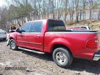 2003 Ford F-150 XLT with VIN 1FTRW07L13KD81923, listed as a IAAI auction lot 42112168 with 147,039 mi miles. Bid and sale history available at carsss.com. Image 15.