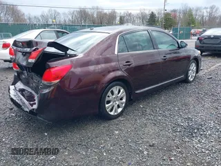 2012 Toyota Avalon with VIN 4T1BK3DB7CU451855, listed as a IAAI auction lot 41964456 with 153,921 mi miles and . Bid and sale history available at DreamBid. Image 4.