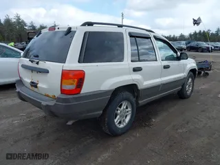 2004 Jeep Grand Cherokee Laredo with VIN 1J4GW48S54C393518, listed as a IAAI auction lot 41984570 with 187,066 mi miles. Bid and sale history available at carsss.com. Image 4.