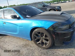 2015 Dodge Charger SXT with VIN 2C3CDXHG1FH848019, listed as a IAAI auction lot 42124399 with 175,247 mi miles and . Bid and sale history available at DreamBid. Image 6.