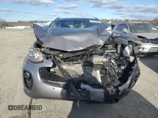 2018 Kia Sportage EX z VIN KNDPNCAC1J7308457, wystawiony jako Copart lot #81574704 z przebiegiem Nie podano mil oraz Szkoda całkowita • Salvage title. Historia ofert i sprzedaży dostępna na DreamBid. Obrazek 5.