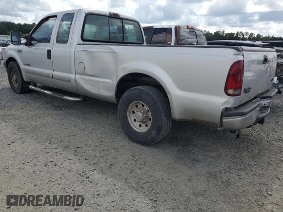 2001 Ford Super Duty F-250 XL with VIN 1FTNX20F61EB23095, listed as a Copart auction lot 74060304 with 458,656 mi miles and Salvage Title. Bid and sale history available at carsss.com. Image 2.