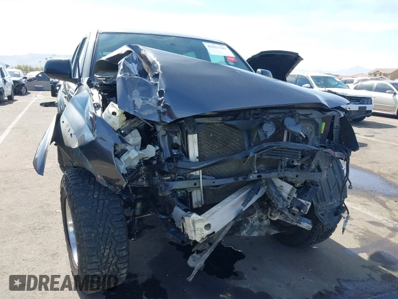 2014 Toyota Tacoma with VIN 3TMLU4EN0EM145573, listed as a IAAI auction lot 41621189 with 178,281 mi miles. Bid and sale history available at carsss.com. Image 6.