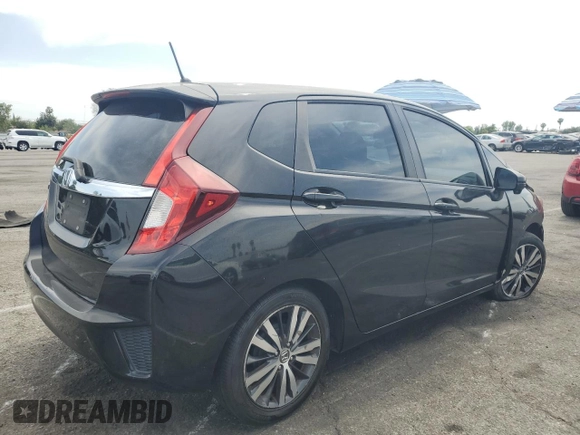 2015 Honda Fit EX-L z VIN 3HGGK5H81FM765225, wystawiony jako Copart lot #56765815 z przebiegiem 126 730 mil mil oraz Szkoda całkowita • Salvage title. Historia ofert i sprzedaży dostępna na DreamBid. Obrazek 3.