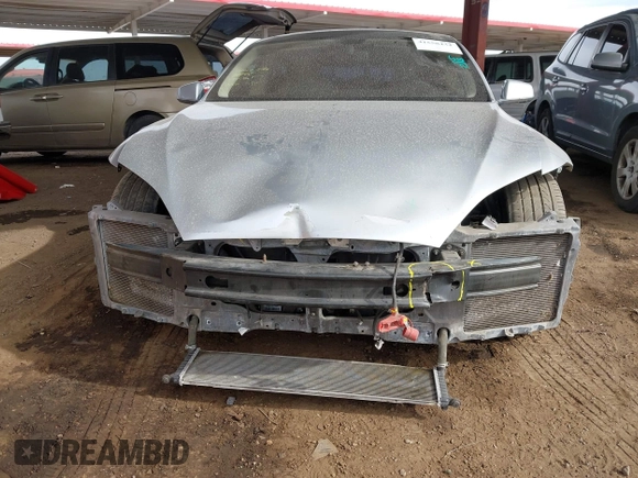 2014 Tesla Model S 60 with VIN 5YJSA1H17EFP35351, listed as a IAAI auction lot 41558434 with 151,002 mi miles and . Bid and sale history available at DreamBid. Image 13.