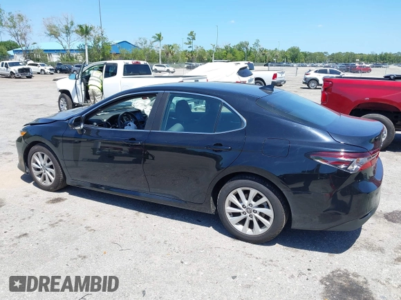 2023 Toyota Camry LE z VIN 4T1C11AK2PU120803, wystawiony jako IAAI lot #42060384 z przebiegiem 38 897 mil mil oraz . Historia ofert i sprzedaży dostępna na DreamBid. Obrazek 12.