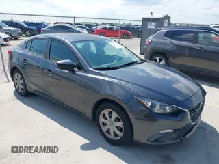 2015 Mazda 3 i Sport z VIN 3MZBM1U76FM124612, wystawiony jako IAAI lot #42380344 z przebiegiem 161 402 mil mil oraz . Historia ofert i sprzedaży dostępna na DreamBid. Obrazek 1.