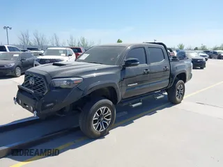 2023 Toyota Tacoma 4WD SR with VIN 3TYCZ5AN0PT110522, listed as a IAAI auction lot 41740128 with 45,115 mi miles. Bid and sale history available at carsss.com. Image 2.