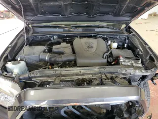 2023 Toyota Tacoma SR z VIN 3TYCZ5AN9PT173473, wystawiony jako Copart lot #54219015 z przebiegiem 22 740 mil mil oraz Szkody całkowita. Historia ofert i sprzedaży dostępna na DreamBid. Obrazek 11.