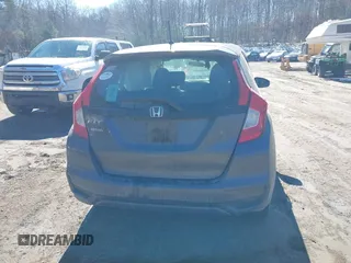 2018 Honda Fit LX z VIN 3HGGK5G44JM716592, wystawiony jako IAAI lot #41878820 z przebiegiem 70 464 mil mil oraz . Historia ofert i sprzedaży dostępna na DreamBid. Obrazek 16.