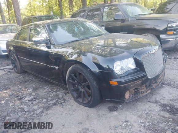 2006 Chrysler 300 C SRT8 with VIN 2C3LA73W66H249303, listed as a IAAI auction lot 42009645 with 137,242 mi miles. Bid and sale history available at carsss.com. Image 1.