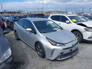 2022 Toyota Prius L Eco with VIN JTDKAMFU0N3181467, listed as a IAAI auction lot 41802679 with 121,749 mi miles and . Bid and sale history available at DreamBid. Image 1.
