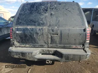 1999 GMC Denali z VIN 1GKEK13R1XR914199, wystawiony jako Copart lot #46247985 z przebiegiem 143 628 mil mil oraz Szkoda całkowita • Salvage title. Historia ofert i sprzedaży dostępna na DreamBid. Obrazek 6.