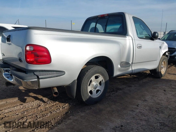 2003 Ford F-150 XL with VIN 1FTRF07W73KB60420, listed as a IAAI auction lot 41454500 with 168,135 mi miles and . Bid and sale history available at DreamBid. Image 4.