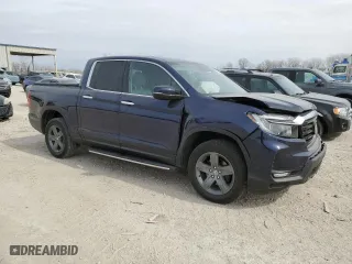 2021 Honda Ridgeline RTL-E with VIN 5FPYK3F7XMB022704, listed as a Copart auction lot 47239635 with 31,428 mi miles and Salvage Title. Bid and sale history available at carsss.com. Image 4.