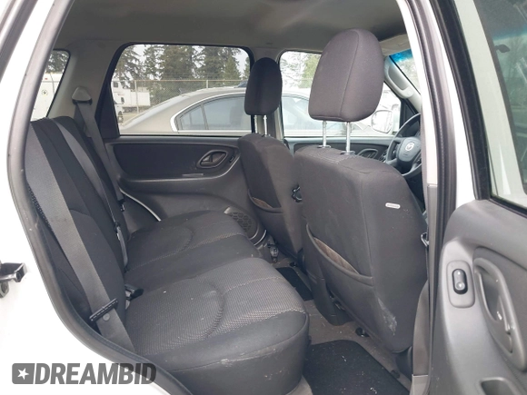 2005 Mazda Tribute LX with VIN 4F2CZ94105KM25420, listed as a IAAI auction lot 41450750 with 148,736 mi miles. Bid and sale history available at carsss.com. Image 8.