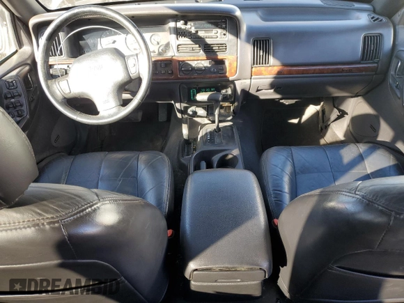 1997 Jeep Grand Cherokee Limited with VIN 1J4GZ78Y4VC568288, listed as a Copart auction lot 88265025 with 185,015 mi miles and Salvage Title. Bid and sale history available at carsss.com. Image 8.