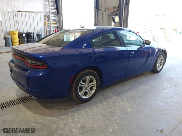 2022 Dodge Charger SXT with VIN 2C3CDXBGXNH231158, listed as a IAAI auction lot 41980059 with 61,770 mi miles. Bid and sale history available at carsss.com. Image 4.