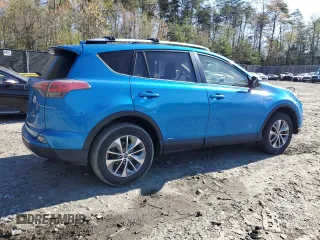 2016 Toyota RAV4 Hybrid XLE with VIN JTMRJREV4GD003211, listed as a Copart auction lot 52111305 with 79,404 mi miles and Salvage Title. Bid and sale history available at carsss.com. Image 3.